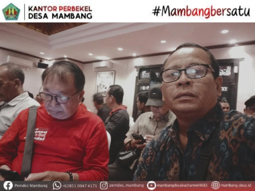 PERBEKEL DESA MAMBANG MENGHADIRI RAPAT SOSIALISASI BANTUAN PANGAN  BERAS TH 2025